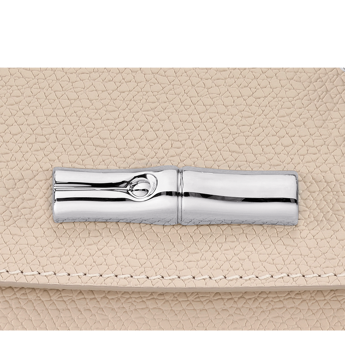 Roseau Clutch, Papel