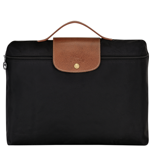 Longchamp Le Pliage is the one bag I will always recommend and keep on  buying as a laptop bag. And with the smaller footprint of 13” laptops now,  it can already fit