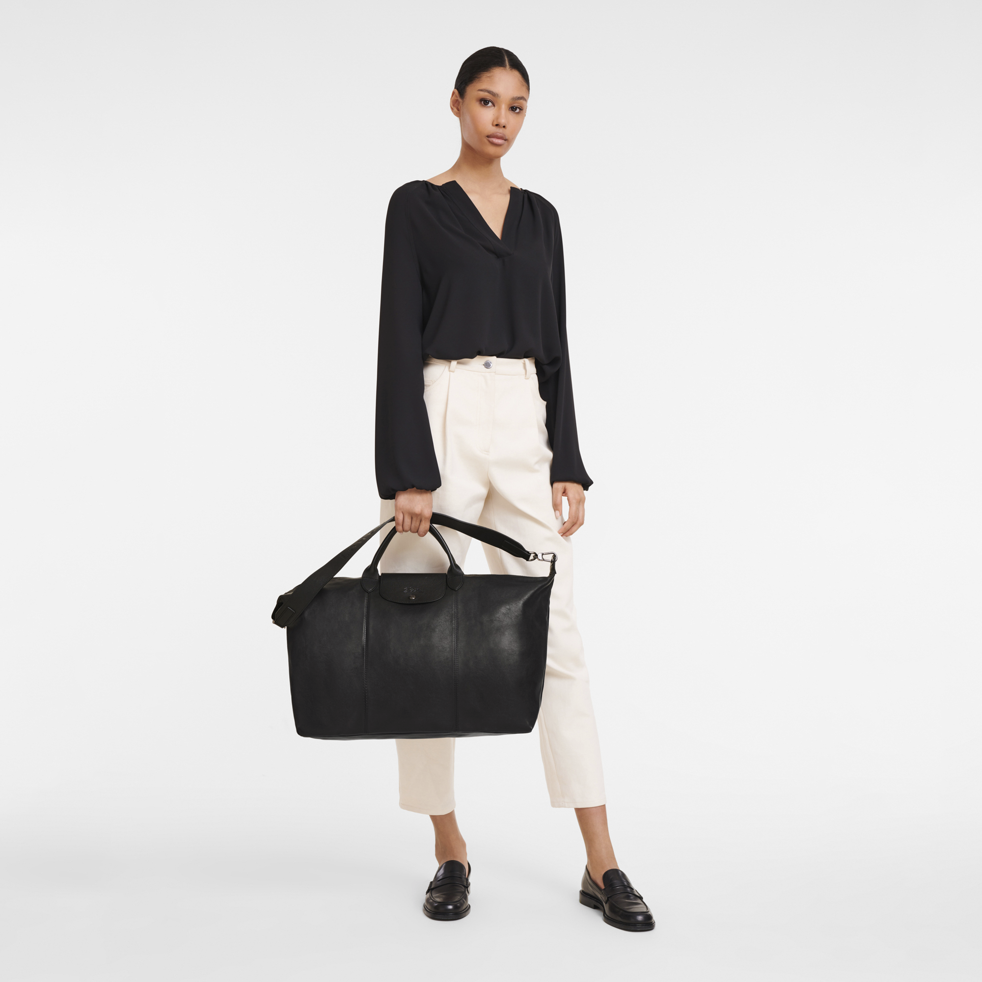 Longchamp leather travel bag clearance