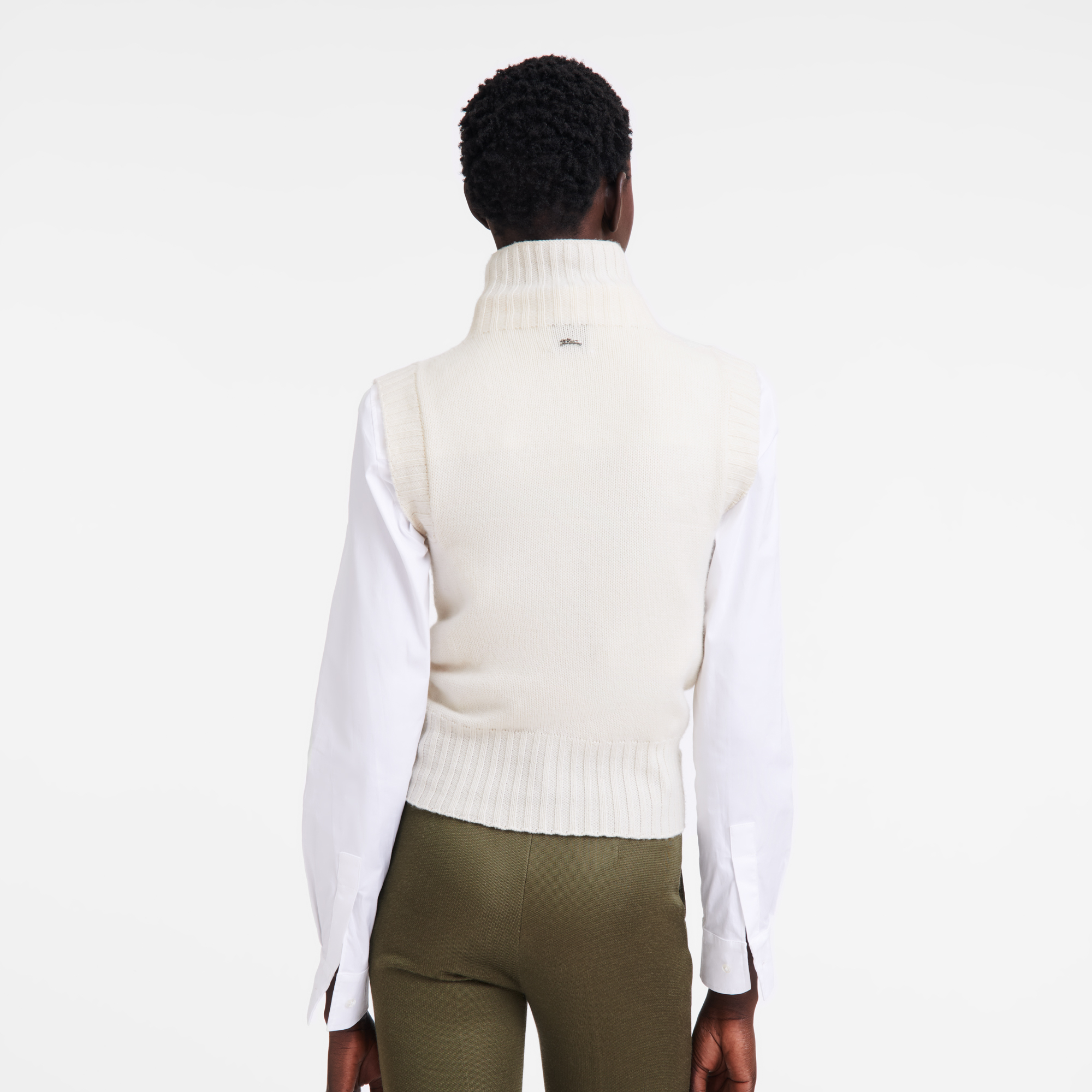 white no sleeve turtleneck